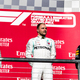 The podium: Valtteri Bottas, first (middle); Lewis Hamilton, second (left); Max Verstappen, third (right).